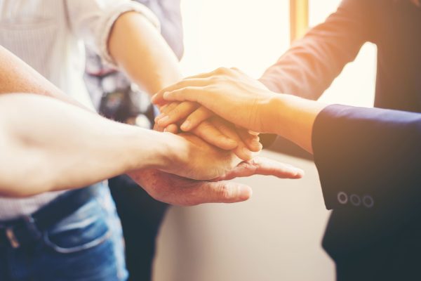 hands-joined-by-team